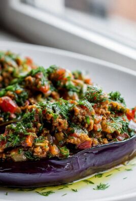 Gefüllte Auberginen mit Gyros und Zitronen-Kräutersauce